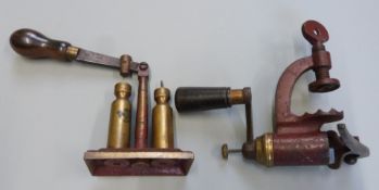 Two G & J W Hawksley type 12 bore shotgun cartridge re-loading tools, one capper and decapper and