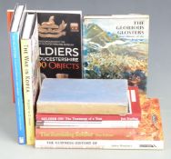 Eleven military related books including 'The Glorious Glosters' by Tim Carew, 'The War in Korea'