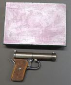 Tell II .177 air pistol with chequered wooden grips, NVSN, in reproduction box.