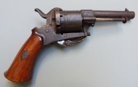 Belgian 6mm six-shot double action pinfire revolver with shaped wooden grips, folding trigger and