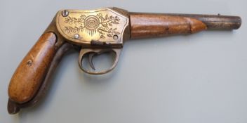 11mm brass framed Martini action pistol with deeply engraved frame, shaped underlever, grips and