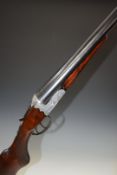 A Mino Gardone VT Italian 12 bore side by side ejector shotgun with engraved scenes of birds to