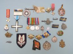 Small collection of militaria including miniature medals, veteran's badge, cloth Special Air Service