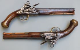 A pair of flintlock holster pistols with Miquelet locks, engraved hammers, pans and top straps,