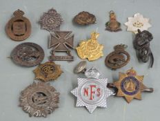 Fourteen military pin back badges including hallmarked silver Army Service Corps, South Wales