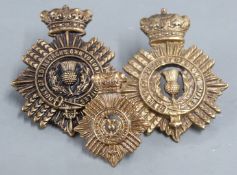 Three Duke of Edinburgh Own Volunteer Rifles metal badges