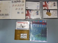 A quantity of empty albums, reference books and Olympic first day covers