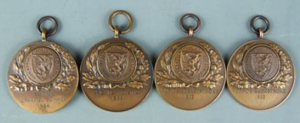 Four 1953/1954 Coronation bronze swimming medals for King Edward VII School, Sheffield, the
