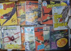 Over 70 comic books with various themes including TV, war and Western including Commando, War