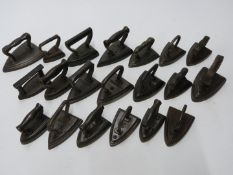 Twenty small or miniature flat irons, sizes 00 up to 4, including TS, W.B.& Co. J & J Siddons and