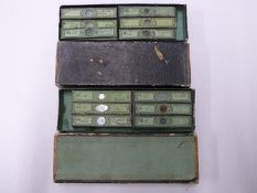 Two boxes of late 19th/20thC microscope slides, all numbered and annotated, approximately 70 in
