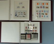 A collection of mint and used Canada stamps 1870-1990 in three Lindner albums. Mint stamps appear