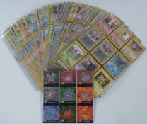 An album of over 440 Pokemon trading cards including rarer and shiny examples together with a sealed