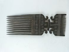 African tribal carved comb, Zanzibar probably first quarter 20thC, H26cm