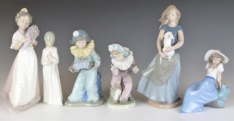 Six Nao figures including clown musician, tallest 26cm