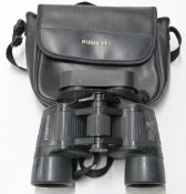 Bushnell 10x42 binoculars, in original pouch