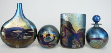 Four pieces of Isle of Wight glass comprising two vases, scent bottle and a paperweight all with