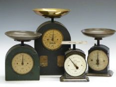 Four household and family scales, comprising Hughes' No 48 and No 48B, a De Luxe household scale and