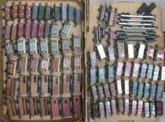 One-hundred-and-two Tri-ang and Hornby 00 gauge model railway wagons, vans and trucks.