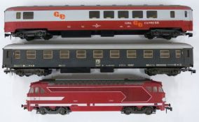 Lima 0 gauge SNCF BO-BO locomotive 67001 and two coaches.