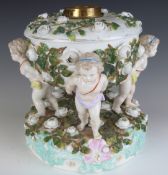 A 19thC German figural majolica two part oil lamp base/ centrepiece, H25cm