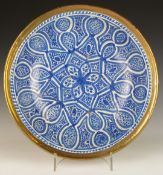 An 18th/19thC Islamic Hispano Moresque charger / pedestal dish with metal mounts, diameter 38cm