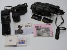 Canon EOS 850 SLR camera with 35-70m 1:5-4-5 lens, Canon Speedlight 300F flash and a Canon VC -