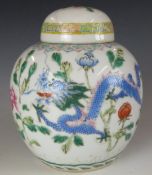 A 19th/20thC Chinese covered ginger jar with dragon decoration, H15cm