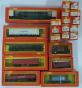 Twenty-one Tri-ang Hornby 00 gauge model railway wagons, tankers and vans including London Brick,