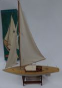 Graupner Collie kit built model pond yacht on stand, with original box.