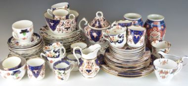 A large collection of 19th/20thC English Imari teaware and a pair of Japanese vases