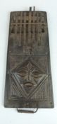 African Chokwe, Angola, tribal thumb piano with carved mask decoration, probably late 19th/20thC