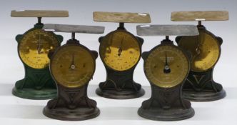 Five Salter No 25 postal parcel balances, three 32oz and two 11lb examples, all with postage rates