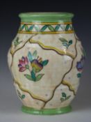 Charlotte Rhead for Crown Ducal signed ribbed pedestal vase decorated with sprays of flowers,