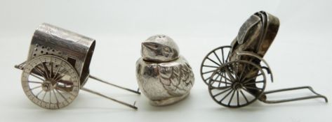 Chinese silver pepper in the form of a chick, with character marks to base, L5cm, and two silver