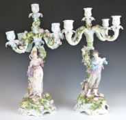 A pair of 19th/20thC German porcelain figural candelabra, H47cm
