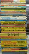 Forty-two film and TV related cartoon books and annuals including Laurel & Hardy, Huckleberry Hound,
