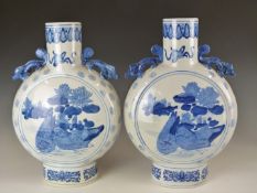 A pair of Chinese blue and white moon flasks with lizard handles, H37.5cm