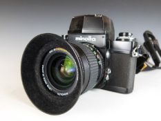 Minolta XM SLR camera with 28mm 1:2 lens