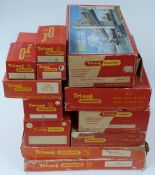 A collection of Tri-ang 00 gauge model railway buildings and accessories including Operating