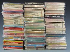 Over 100 collectable paperback books including first editions, Mad, Peanuts, Man From UNCLE etc.