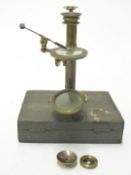 Georgian brass field microscope, in original fitted shagreen covered box with attachments and