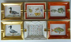 Six Hermès style cigar ashtrays decorated with fish, birds and butterflies, 15 x 19cm