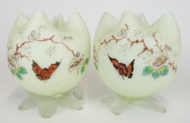 A pair of Stevens and Williams Stourbridge glass vases with enamel butterfly and flower decoration