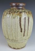 Mike Dodd (b 1943) attributed studio pottery cut sided vase, H27cm