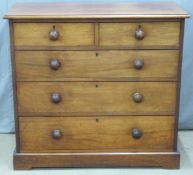 Victorian mahogany chest of two over three drawers with turned handles, W105 x D48 x H97cm