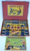Meccano Outfit 3 with blue and gold parts and red wheels, in original box with instructions.