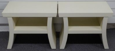 A pair of designer side / coffee tables with undershelves raised on convex legs, probably Philippe