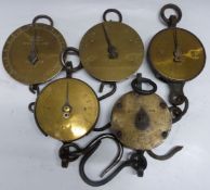 Five Salter spring balances with circular brass dials comprising GPO marked 50lb, one calibrated