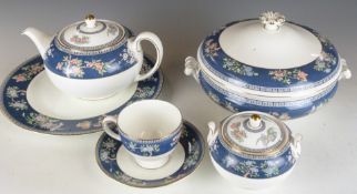Thirty three pieces of Wedgwood dinner and tea ware decorated in the Blue Siam pattern, six place